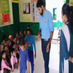 Kids playing blind fold activity with few teachers